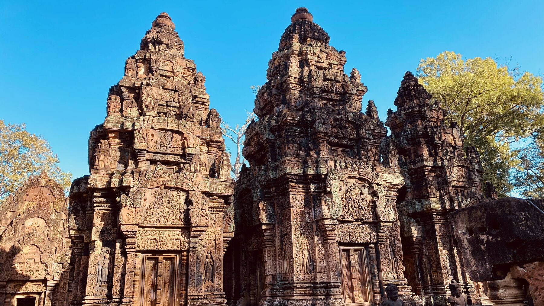 Ornately carved pink sandstone towers of Banteay Srey