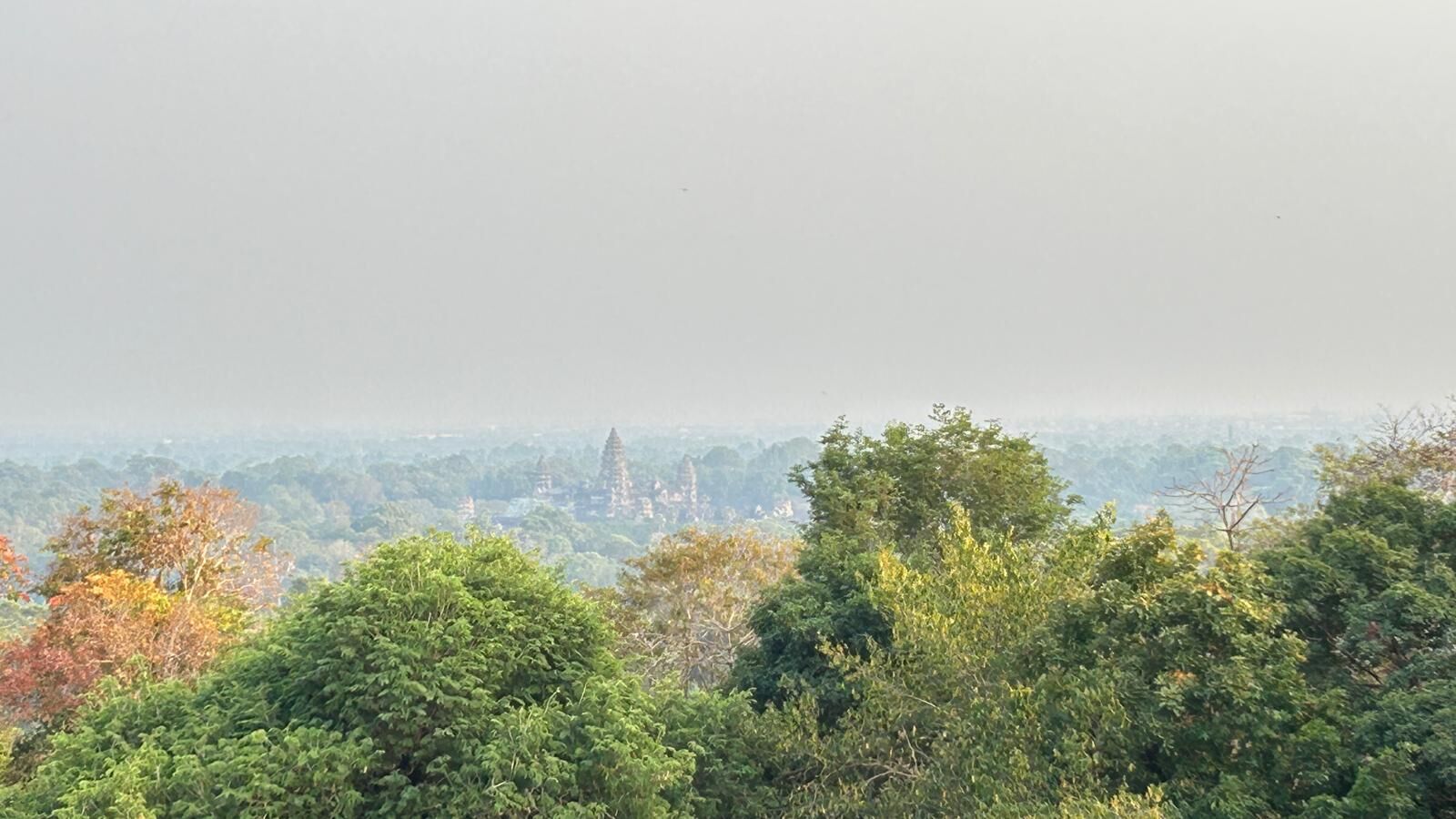Angkor Wat towers rising above the jungle