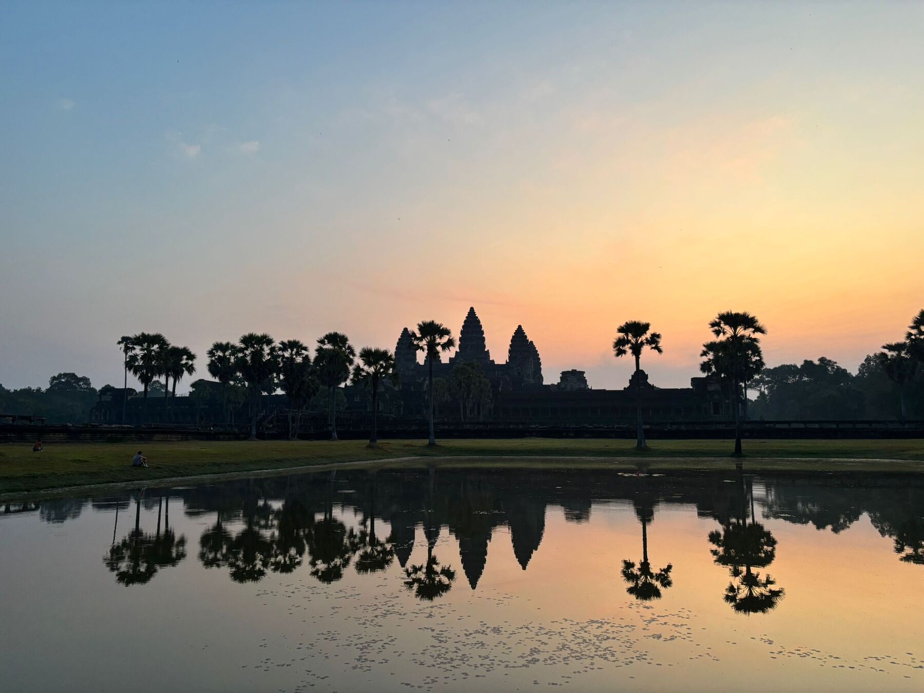 Sunrise over Angkor Wat reflected in the pond